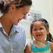 women and girl laughing