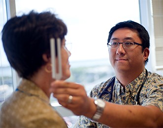 KMA doctor with patient