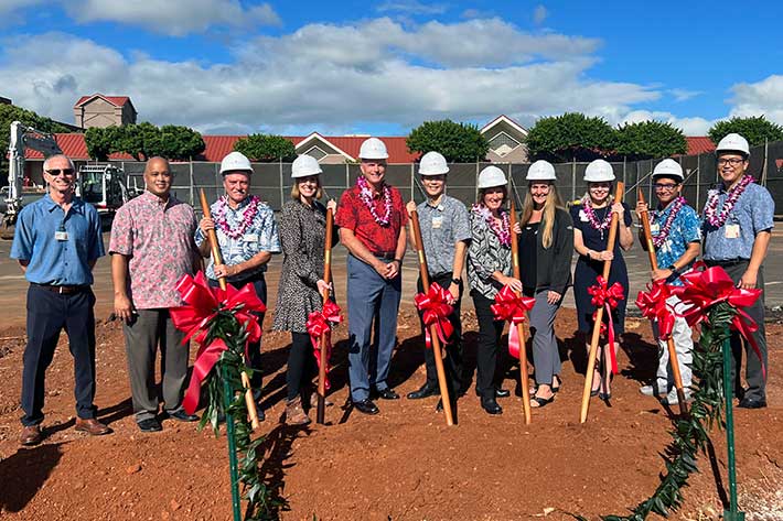 Group shot of medical leaders at clinic groundbreaking