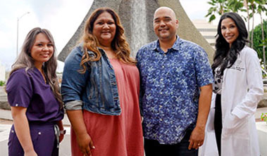Group picture of patient with spouse and two care providers