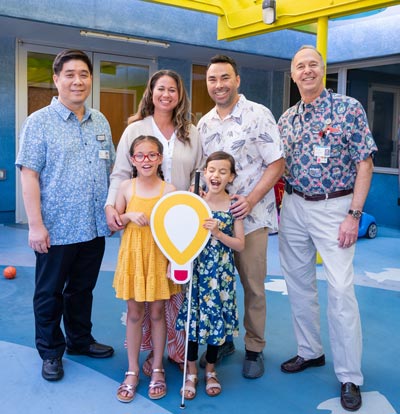 The Awa family with Dr. Glaser and Dr. Sim