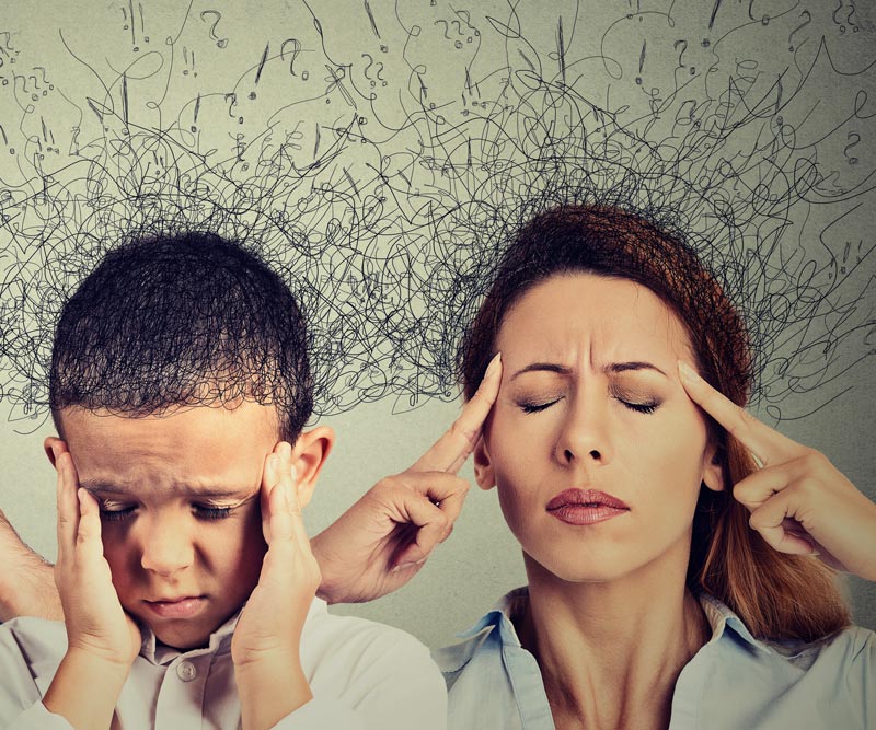 Closeup portrait of sad young man, boy and woman with worried stressed facial expressions and brain melting into lines of interconnected question marks