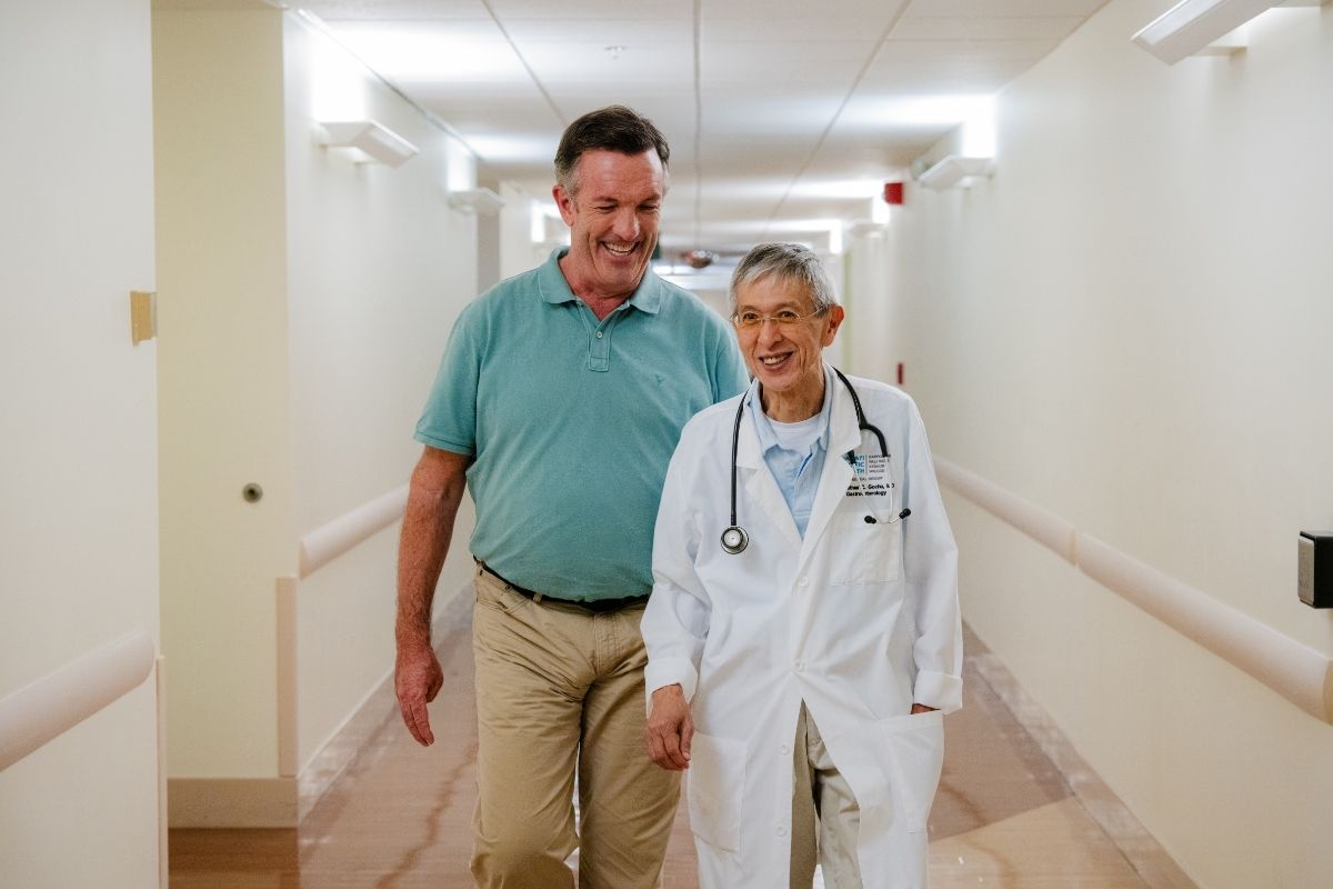 Scott Brown and Dr. Gochu at Straub Benioff Medical Center.