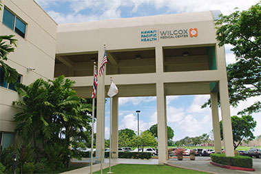 Exterior of Wilcox Medical Center's entrance known as the spine.