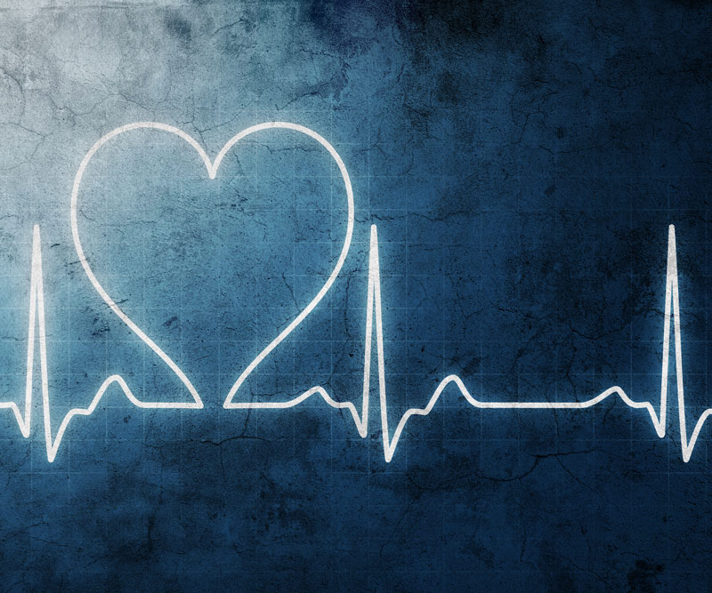 An ekg monitor with a representative heart image