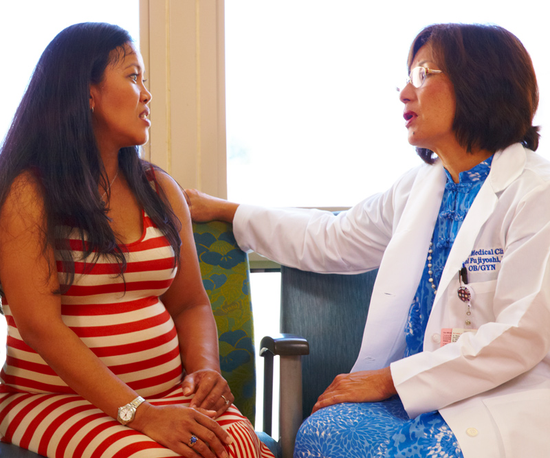 doctor diagnosing patient